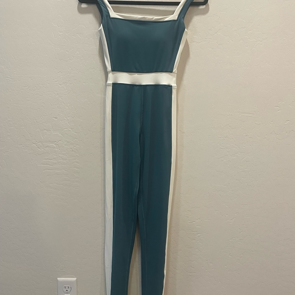 Chic Blue and White Jumpsuit with Sporty Accents